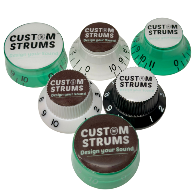 A collection of colorful, personalized Custom Strums guitar knobs